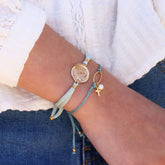 ANNIE DOR - pearl and gold cross bracelet 5x6mm